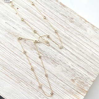 Long gold layering necklace boutique salon